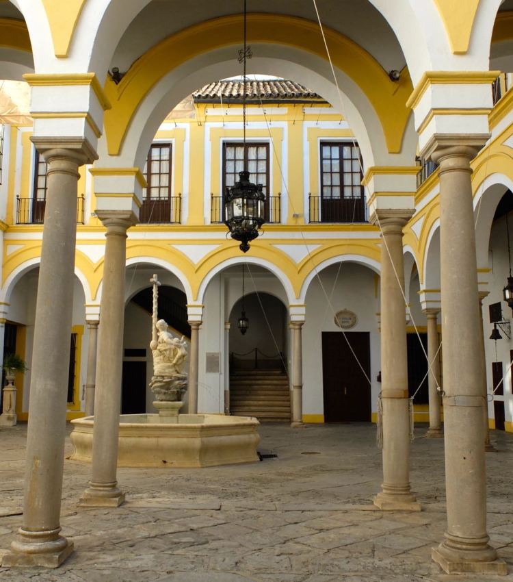 Painted yellow on the arches with blue mosaic